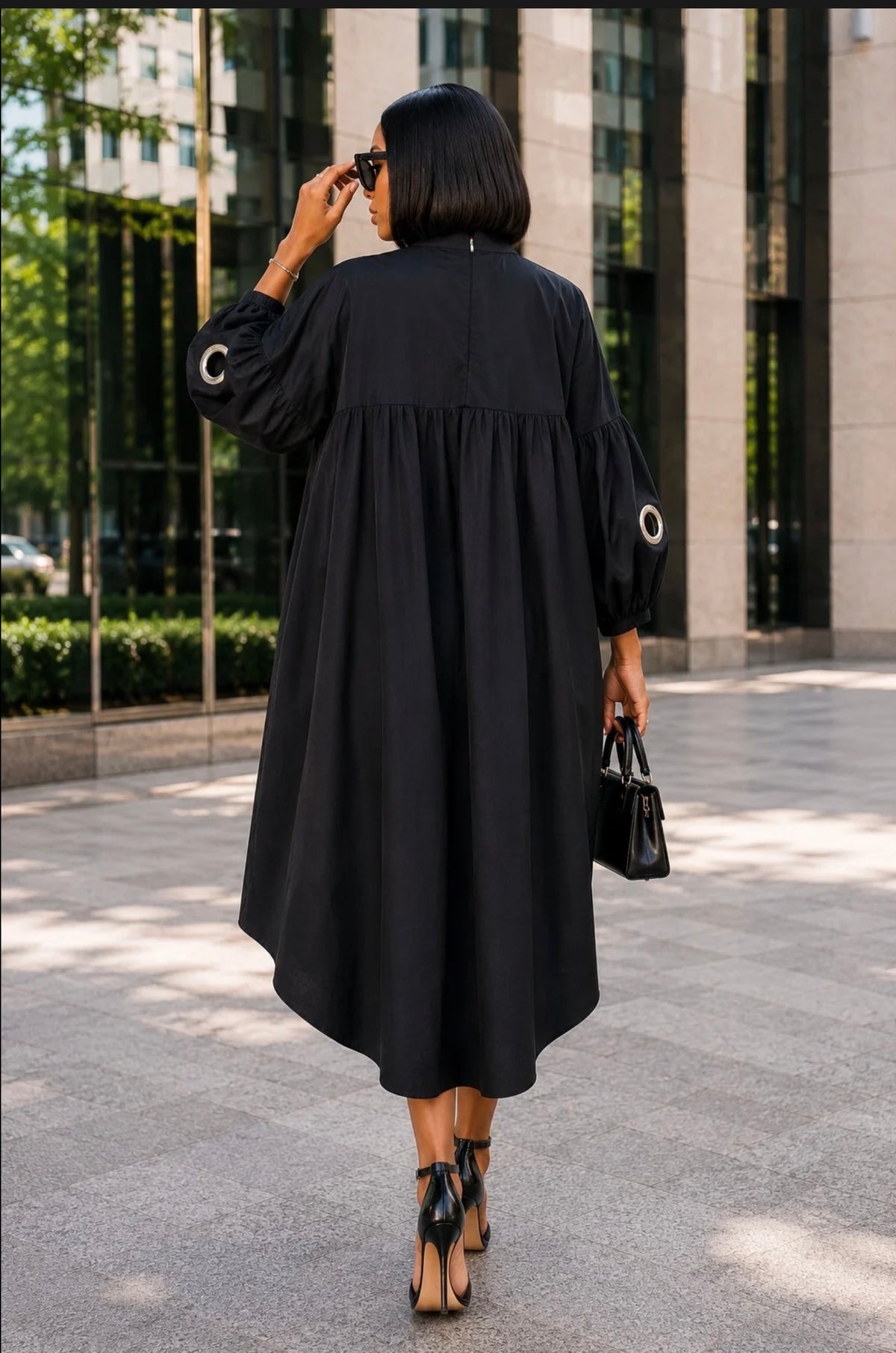 The Vanguard Grommet Hi-Low Mini Dress