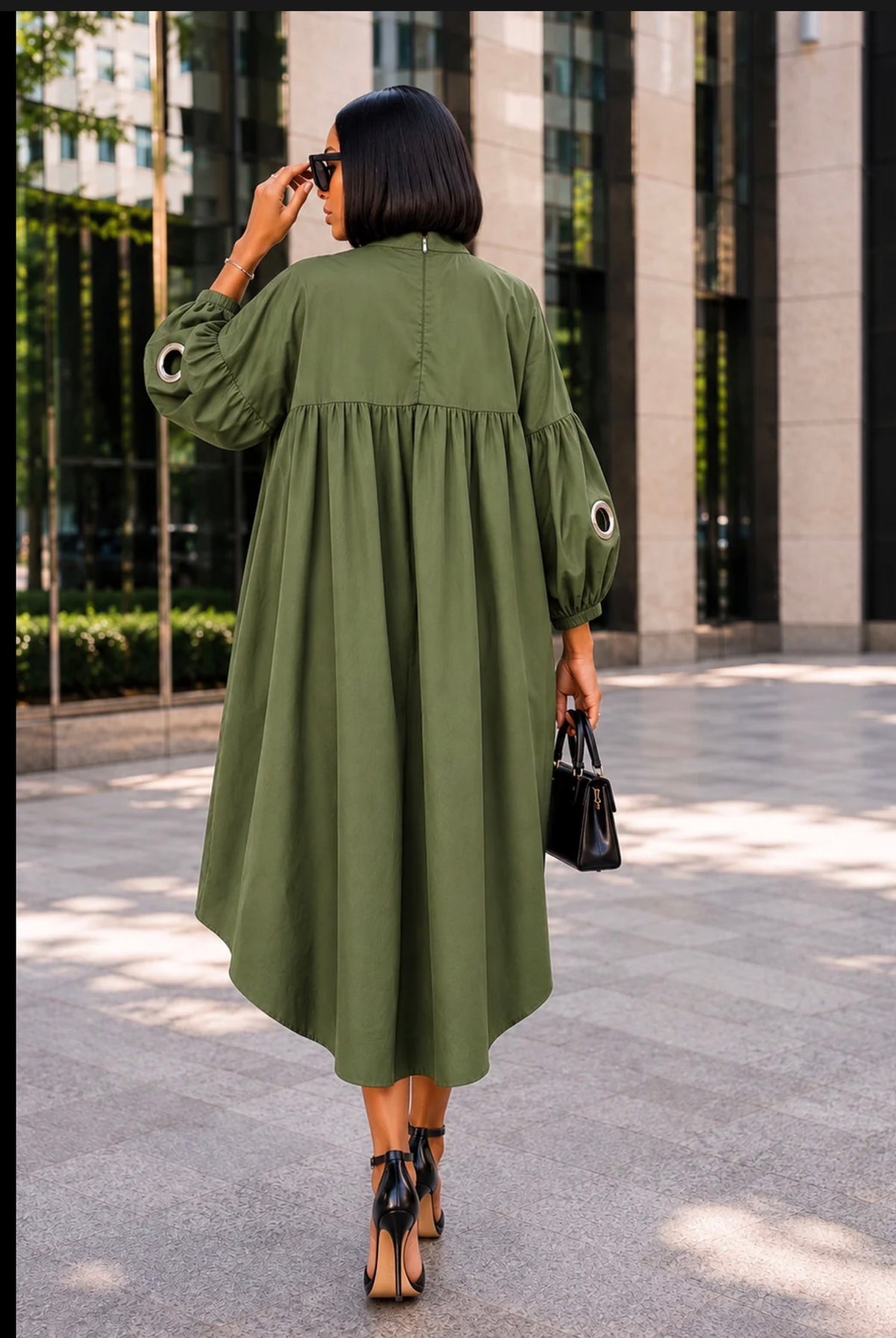 The Vanguard Grommet Hi-Low Mini Dress