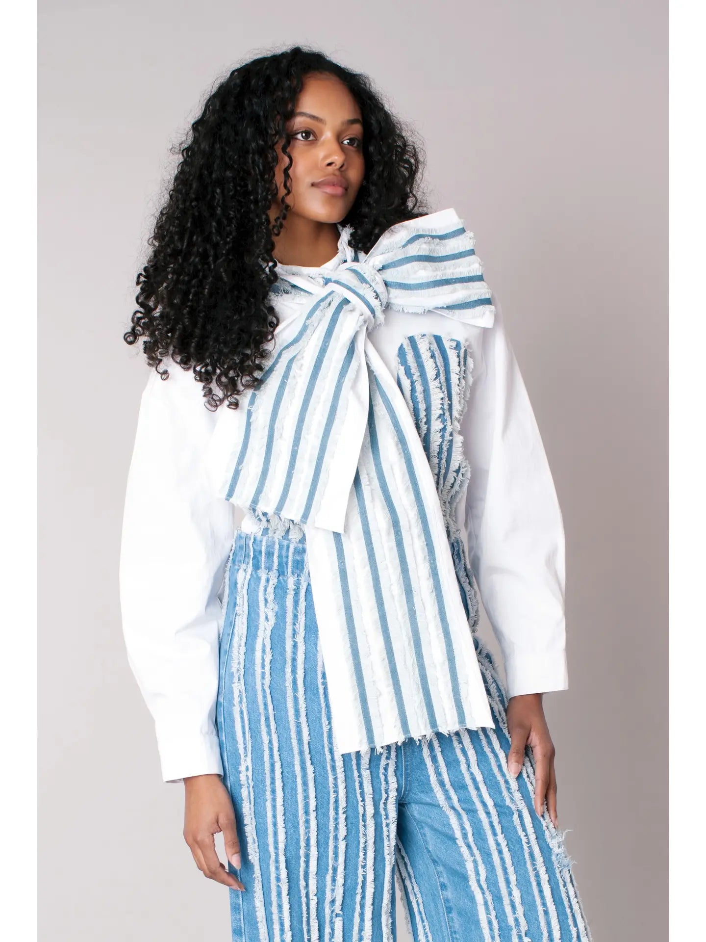 Asymmetric Stripe Top with Statement Bow & Vertical Distressed Stripe Denim Jeans